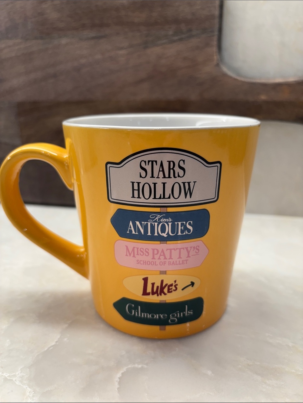 NWT Gilmore Girls Yellow Ceramic Mug featuring Stars Hollow Icon direction signs